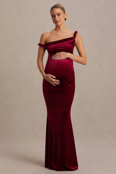 Club L London Tallulah | Burgundy Velvet Asymmetric-Neck Maternity Maxi Dress With Twist-Sleeve