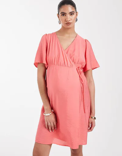 ASOS Vero Moda Maternity flutter sleeve wrap front mini dress in coral pink