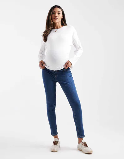 ASOS skinny jeans with over bump in dark blue